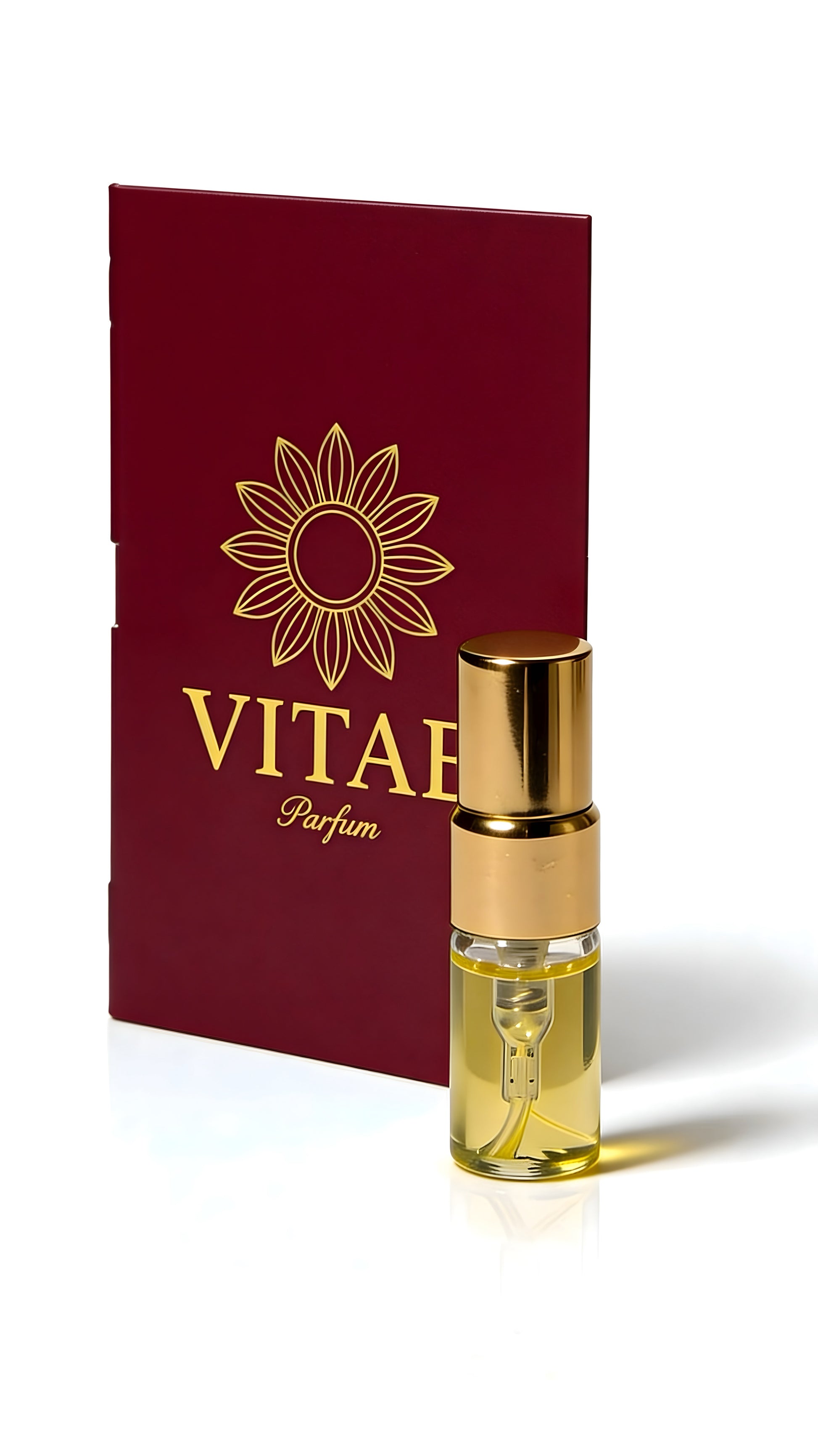 Vitae Red Parfum with gold emblem and sample vial